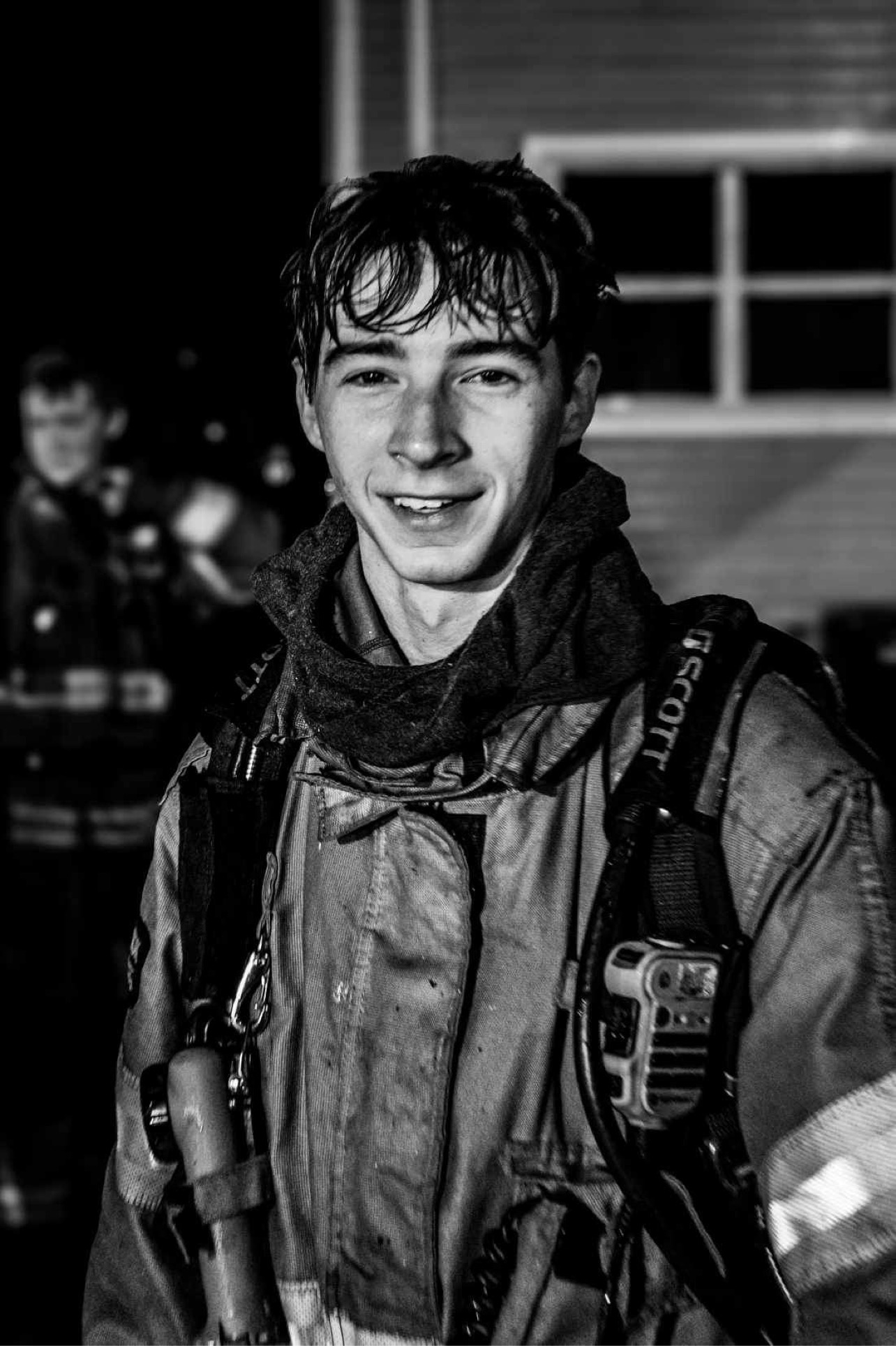 Cameron in firefighter turnout gear